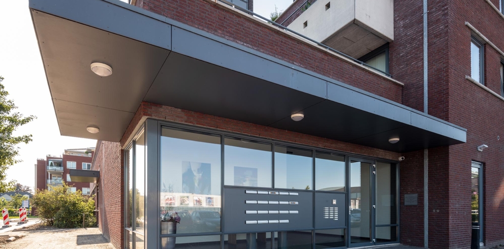 Lightronics DOTT armaturen bij de entree van een appartementencomplex in Bergambacht
